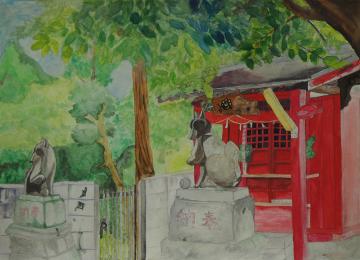 大きな木の下の両側に狛狐が設置された小さな赤色の社殿の神社を描いた小澤 七美さんの作品